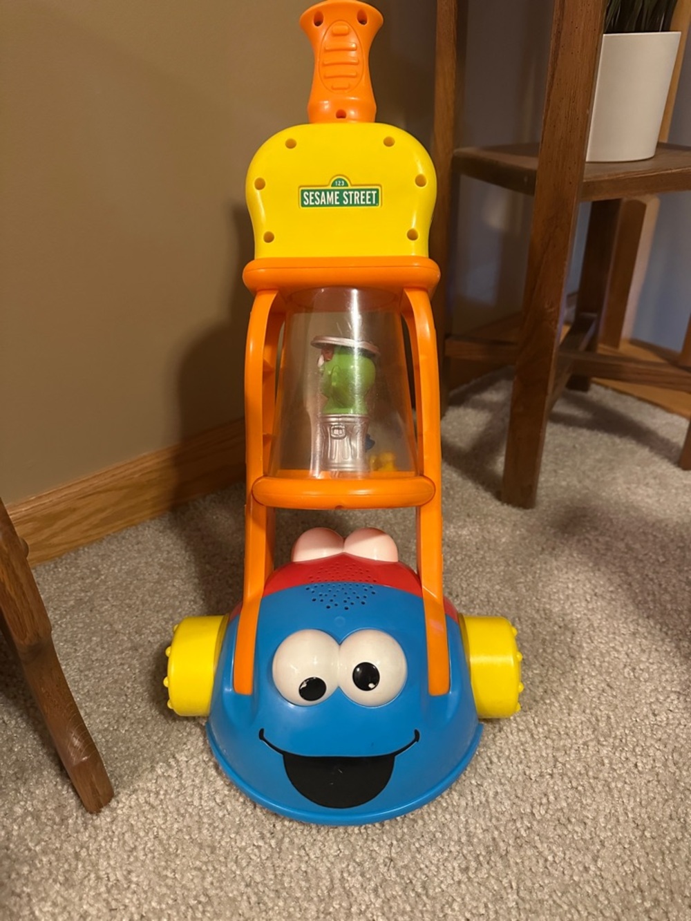 Sesame Street Blue and Yellow Push Along Vacuum Toy with Orange Handle